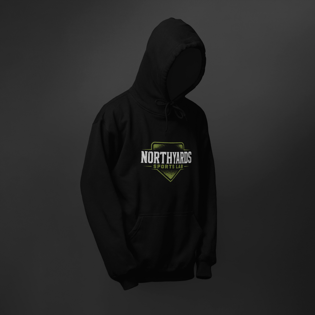 Black Northyards Classic Logo pullover hoodie with white and green Sports Lab badge centred on the chest and a kangaroo pocket