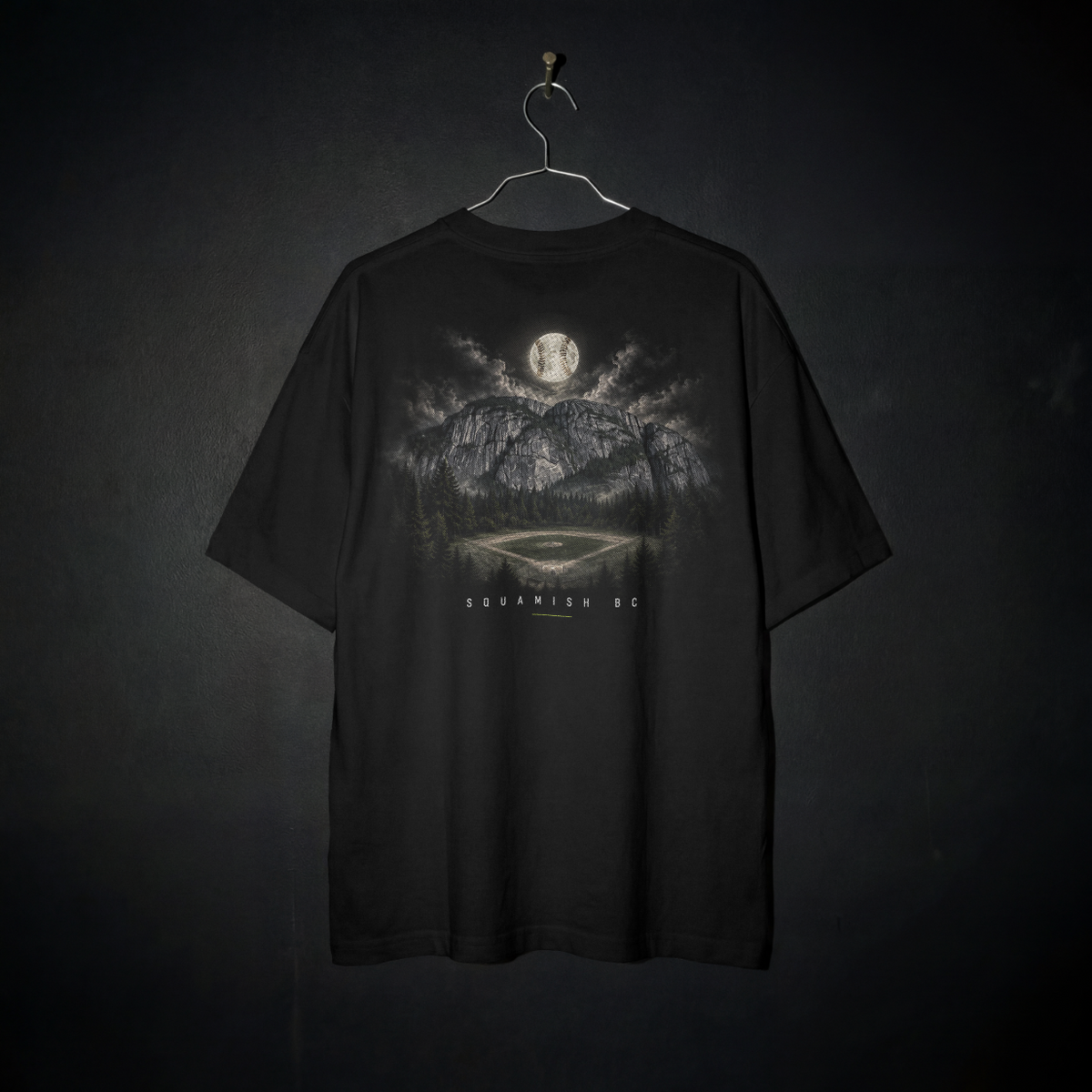 Home Field Tee back – Squamish Chief above a forest-lined baseball diamond, with a baseball moon and Squamish BC lettering