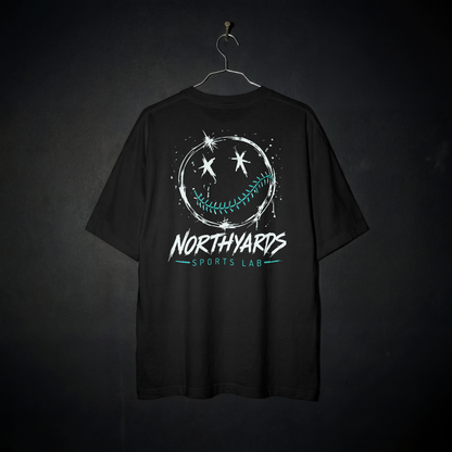 Smiley 1.0 Tee back – distressed white smiley face with crossed-out eyes and teal baseball-stitched smile above Northyards Sports Lab lettering